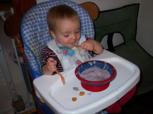 Logan Feeding Himself