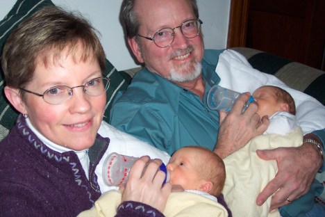 Nana and Grandpa feeding the twins