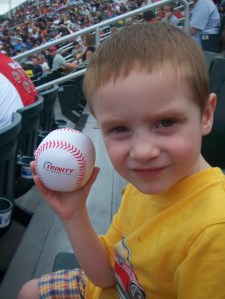 Mommy caught a (very soft, thrown by an entertainer) ball for Burke